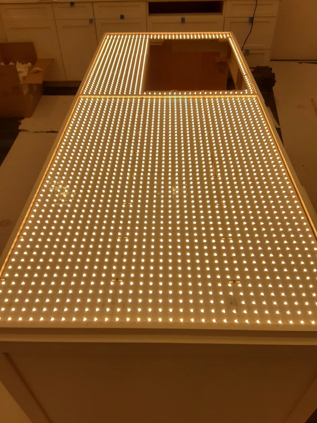Backlit onyx countertop glowing with LED lights