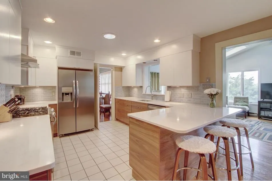 Open kitchen remodel with island seating